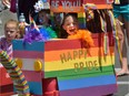 Caroline Haagsman, 7, peers out of her decorated wagon during the annual London Pride Parade on Sunday July 30, 2017.  (Free Press file photo)