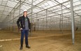 Bruce Dawson-Scully, the CEO of WeedMD stands inside just one part of their massive greenhouse complex located between Strathroy and Mt. Brydges within Perfect Pick Farms. (Mike Hensen/The London Free Press)