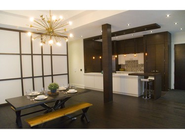 The main floor kitchen and dining area of 152 Elmwood Ave in Old South are open concept. The building was originally designed as a condo, now being used as a single family dwelling with an upper floor for AirBnB and events. (Mike Hensen/The London Free Press)