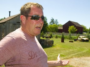 Rick Burt's back yard looks over the new abbatoir planned for Longwoods Road just west of Lambeth in London. Burt says the business should be out in the country, where they could have more land to give less negative impacts to neighbours like himself. (Mike Hensen/The London Free Press)