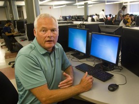 Dave Smith, the Senior Manager Retail Services for Fanshawe College talks about a class action lawsuit based on flat screen monitors. (Mike Hensen/The London Free Press)