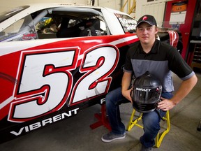 Jake Sheridan, 15 of Mt. Brydges races in the top APC series and the regular late model series at Delaware Speedway. He was photographed in the family garage with his car, which bears the same number 52 as his dad Ron Sheridan used to run. (Mike Hensen/The London Free Press)