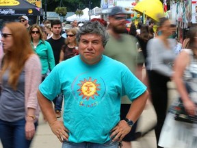 Alfredo Caxaj stands in the crowds at Sunfest on Friday July 6, 2018.  Mike Hensen/The London Free Press/Postmedia Network