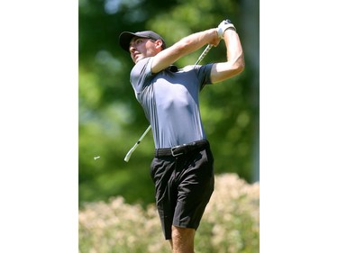 Chase Komaromi tees off on the ninth hole of the St. Thomas Golf and Country Club in Union on the first day of the Ontario Men's Amateur on Tuesday. (Mike Hensen/The London Free Press)