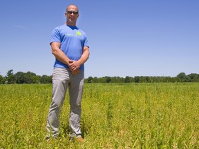 WeedMD boss Keith Merker stands in a field that will be used to grow marijuana outdoors in Strathroy. (Mike Hensen/The London Free Press)