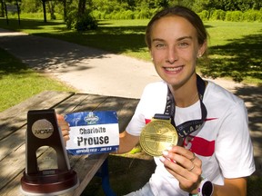 Charlotte Prouse of London, a former London Central standout, shows off the hardware from a successful spring NCAA track and field campaign. Prouse placed second in the steeplechase at the NCAA championship held in historic Hayward Field in Oregon this spring. She won an All-American medal for a top finish as well as a trophy for the steeplechase second, and other prizes from the last meet to be held at the field before it was torn down. (Mike Hensen/The London Free Press)