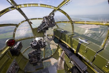 The business end of a WWII Mitchell B-25 bomber with a bomb sight and a 50 cal. machine gun in the nose. The bomber was flying over Sarnia as part of a tour by the Commemorative Air Force on Thursday July 12, 2018. The B-25 was made famous by the Doolittle Raid, early in WWII after the U.S. was hit by the Japanese at Pearl Harbour, 16 B-25's launched off an aircraft carrier and bombed Tokyo and then ditched their planes in China. Mike Hensen/The London Free Press/Postmedia Network