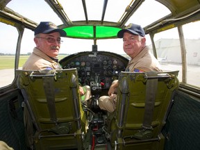 Pilot Richard Petty and pilot and Operations officer Travis Major after flying Mitchell B-25 bomber over Sarnia as part of a tour by the Commemorative Air Force on Thursday. The B-25 was made famous by the Doolittle Raid, early in the Second World War after the U.S. was hit by the Japanese at Pearl Harbour, Sixteen B-25's launched off an aircraft carrier and bombed Tokyo and then ditched their planes in China. Mike Hensen/The London Free Press/Postmedia Network