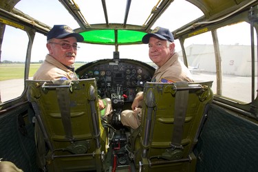 Pilot Richard Petty and pilot and Operations officer Travis Major after flying a WWII Mitchell B-25 bomber over Sarnia as part of a tour by the Commemorative Air Force on Thursday July 12, 2018. The B-25 was made famous by the Doolittle Raid, early in WWII after the U.S. was hit by the Japanese at Pearl Harbour, 16 B-25's launched off an aircraft carrier and bombed Tokyo and then ditched their planes in China. Mike Hensen/The London Free Press/Postmedia Network