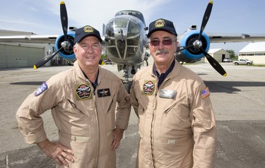 Operations officer/ pilot Travis Major and Pilot Richard Petty after flying a WWII Mitchell B-25 bomber over Sarnia as part of a tour by the Commemorative Air Force on Thursday July 12, 2018. The B-25 was made famous by the Doolittle Raid, early in WWII after the U.S. was hit by the Japanese at Pearl Harbour, 16 B-25's launched off an aircraft carrier and bombed Tokyo and then ditched their planes in China. Mike Hensen/The London Free Press/Postmedia Network