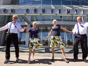 Dan and Rhetha Roy are the organizing couple for the 20th Canadian National Square and Round Dancing Convention. They're joined by Avril and Austin Hayward, presidents of the Square and Round dancers of SW Ontario in front of the London Convention Centre on Tuesday. The two-day conference will draw about 800 people from as far as Australia, Germany, Sweden and the United States. (Mike Hensen/The London Free Press)