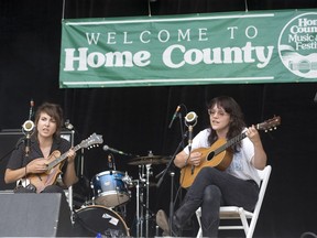 Lisa Marie, left, and Amy Lou of duo Mama's Broke open the 45th annual Home County Music and Arts Festival on July 20, 2018. (Derek Ruttan/The London Free Press)