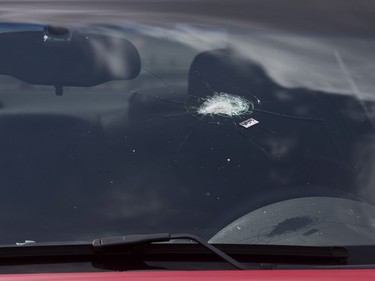 Bob Copland's car was struck by a bullet when several shots were fired from a vehicle on Shepherd Avenue in London on Sunday. The bullet went through the driver's side window, struck the inside of the windshield and lodged in the dashboard. The car was parked in Copland's driveway at the time of the incident. Derek Ruttan/The London Free Press
