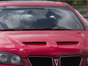 Bob Copland's car was struck by a bullet when several shots were fired from a vehicle on Shepherd Avenue in London on Sunday. The bullet went through the driver's side window, struck the inside of the windshield and lodged in the dashboard. The car was parked in Copland's driveway at the time of the incident. Derek Ruttan/The London Free Press