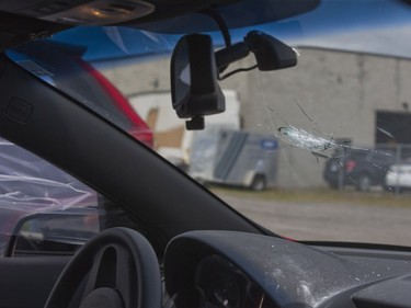 Bob Copland's car was struck by a bullet when several shots were fired from a vehicle on Shepherd Avenue in London on Sunday. The bullet went through the driver's side window, struck the inside of the windshield and lodged in the dashboard. The car was parked in Copland's driveway at the time of the incident. Derek Ruttan/The London Free Press