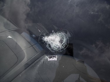 Bob Copland's car was struck by a bullet when several shots were fired from a vehicle on Shepherd Avenue in London on Sunday. The bullet went through the driver's side window, struck the inside of the windshield and lodged in the dashboard. The car was parked in Copland's driveway at the time of the incident. Derek Ruttan/The London Free Press