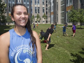 Mini University students play dodge ball with wet sponges behind Mini University Team Leader Donika (cct) Stonefish in London, on Wednesday. Derek Ruttan/The London Free Press/Postmedia Network