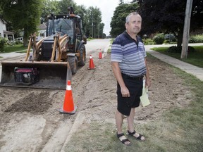 Mayor Vance Blackmore stands at the site where a water main broke Sunday evening in Glencoe, Ont. Photo shot on Monday July 30, 2018. Derek Ruttan/The London Free Press/Postmedia Network