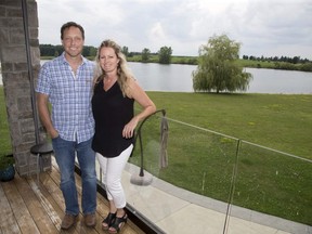 A lake on the property of Julie and Mike Radcliffe will be used for the swimming segment of the triathlon at Ontario Summer Games.  They were photographed in Denfield, Ont. on Monday July 30, 2018. Derek Ruttan/The London Free Press/Postmedia Network