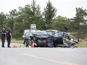 A seven-year-old girl was killed and when the car her mother was driving collided with a pickup truck on Nairn Road at McEwen Dr. in Middlesex County on Monday July 30, 2018. Her mother is hospital with serious injuries, but is recovering. Five people in the pickup truck were taken to hospital with injuries. (Derek Ruttan/The London Free Press)