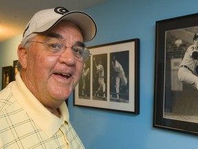 Mike Kilkenny, a longtime major league pitcher and golf pro in his basement with a few of the images of his life in the major leagues. (MIKE HENSEN, The London Free Press file photo)