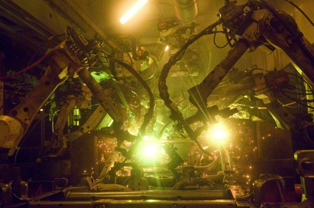 Massive robots weld frames for trucks at Formet in St. Thomas. (File photo)