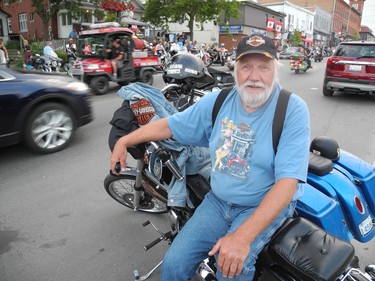 Andrew “Big Mark” Mitchell of Ohsweken was among the thousands taking in the sights and sounds on Main Street during this week’s Friday the 13th motorcycle rally in downtown Port Dover.  (MONTE SONNENBERG \ SIMCOE REFORMER)