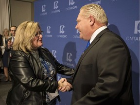 Doug Ford is congratulated by Lisa Thompson, Chair of the PC Ontario Caucus after Ford was named as the newly elected leader of the Ontario Progressive Conservatives at the delayed Ontario PC Leadership announcement in Markham, Ont., on Saturday, March 10, 2018.
