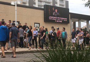 People lined-up down the sidewalk in front of Centennial Hall to see Jordan B. Peterson on Saturday night. (SHANNON COULTER, The London Free Press)