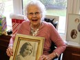 Rene Adams hold a picture of herself when she was about 20 years old. She turned 105 July 20. (SHANNON COULTER, The London Free Press)