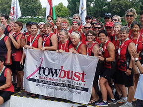 The London area's Rowbust team accepting their gold medals on the podium at the Club Crew world dragon-boat championships in Szeged, Hungary. (Submitted)