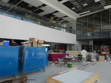 Crews are putting the finishing touches on the spacious atrium area that will serve the YMCA, city arena and recreation facilities and the branch library. (HANK DANISZEWSKI, The London Free Press)