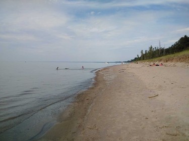 A dip in cool Lake Huron is a hiker's reward near the lookout from Pinery Provincial Park's Wilderness Trail.

BARBARA TAYLOR/THE LONDON FREE PRESS