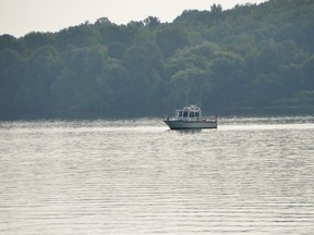 A Ministry of Natural Resources boat sits in Georgian Bay near the harbour on Monday, August 20, 2018 in Owen Sound, Ont. The MNR was assisting the OPP in their search for a man who went missing from a boat on Saturday. Police announced Monday morning that the OPP Underwater Search and Rescue Unit had found a body. Rob Gowan/The Owen Sound Sun Times/Postmedia Network