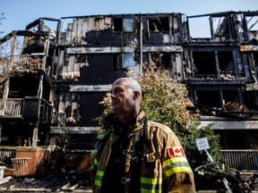 District Fire Chief Ed Pitman speaks at the scene of a fire in the Blue Quill neighbourhood in Edmonton on Sunday, July 29, 2018.