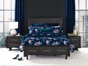 A moody blue blackground makes florals crisp and fresh. (Urban Barn.)