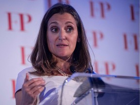 (FILES) In this file photo taken on June 13, 2018 Canadian Foreign Minister Chrystia Freeland gestures as she speaks after receiving Foreign Policy's 2018 Diplomat of the Year award in Washington, DC. Saudi Arabia said on August 6, 2018 that it was expelling the Canadian ambassador and had recalled its envoy while freezing all new trade, in protest at Ottawa's vigorous calls for the release of jailed activists.