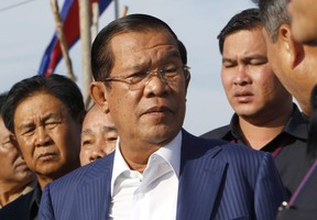 Cambodian Prime Minister Hun Sen arrives for an event in Phnom Penh, Cambodia, Wednesday, Aug. 1, 2018. Determined to extend his 33 years as Cambodia's strongman ruler Hun Sen was not about to let an election derail what he believes is his destiny. The 65-year-old leader had declared he intends to stay in office for 10 more years, and Sunday's general election victory by his Cambodian People's Party should get him halfway to that goal. (Heng Sinith/AP Photo)