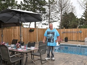Featuring a large deck that overlooks the pool, hypnotist/entertainer 
Dave Curran wanted a home with a cottage-type of feeling that was located in the city. (photos by Jordan Prussky)