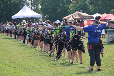 Athletes line up to shoot during Archery round-robin matches on Sunday at Crumlin Sportsmen's Association. (SHANNON COULTER, The London Free Press)