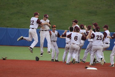 The London Badgers celebrate their 5-4 win over Etobicoke in the 2018 Baseball Canada 18U Championship final at Shell Place in Fort McMurray, Alta., on Sunday, August 19, 2018. Laura Beamish/Fort McMurray Today/Postmedia Network