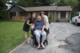 Alex Cha with his sister Jin Cha and mother Jeong Cha at his new home in London. (Derek Ruttan/The London Free Press)