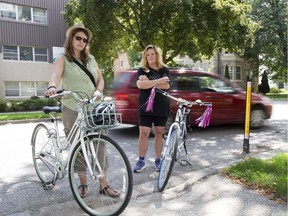Jackie Schuster, left, and Shelley Carr say the traffic-calming measures on such roads as Craig Street have been a failure in London.
(Derek Ruttan/The London Free Press)