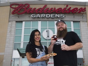 Mariam Waliji of The Root Cellar and Chris Dawdy of London Brewing will be serving pizza a beer at the Forest City Beer Festival. (Derek Ruttan/The London Free Press)