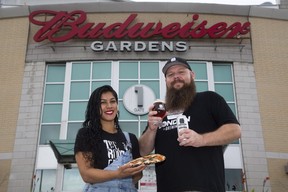 Mariam Waliji of The Root Cellar and Chris Dawdy of London Brewing will be serving pizza a beer at the Forest City Beer Festival. (Derek Ruttan/The London Free Press)