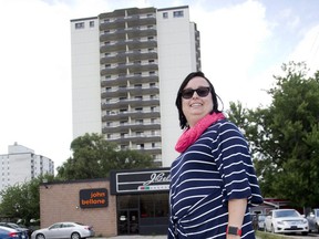 Deana Ruston is supportive of a safe injection site at 446 York St. (currently John Bellone's  Musical Instruments) even though it is in the shadow of her apartment building in London. (Derek Ruttan/The London Free Press)