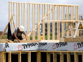 Home construction behind Saint Andre Bessette Catholic High School in the northwest corner of London. (Mike Hensen/The London Free Press)