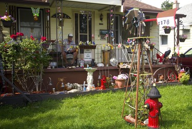 Everything but the kitchen sink, we think: Tough to turn away from the array of cool and creative gardening novelties adorning Tom Quann’s front yard at 1178 Albany St., London. The items ranging from a statue of an eagle to a miniature windmill and a lighthouse reflect the former Newfoundlander’s affections. (MIKE HENSEN, THE LONDON FREE PRESS)