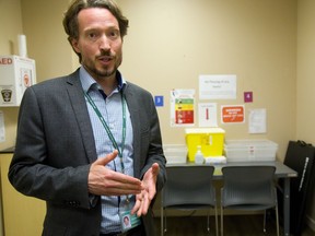 Middlesex-London medical officer of health Dr. Chris Mackie talks about the importance of having a safe and legal drug consumption site in London, Ont.  Mackie was at the King Street drug consumption site on Thursday after the province indicated approval of the temporary site would be extended. (Mike Hensen/The London Free Press)