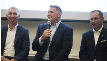 Canadian Football League vice-president Kevin McDonald, former NHL star Eric Lindros and former Olympic and World Cup downhill skier Steve Podborski take part in a panel discussion at the See The Line concussion symposium at Western University on Thursday. (Derek Ruttan/The London Free Press)